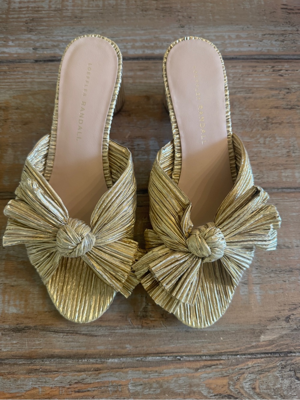 Loeffler Randal gold bow sandals. Size 7. Never worn